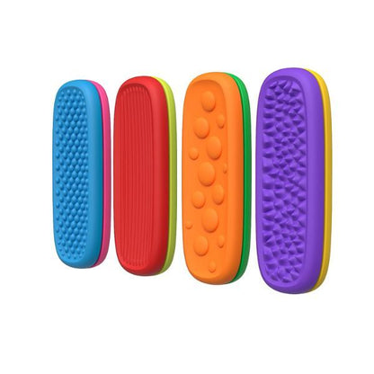 Fyra olika relax bars staplade i par – varje sida med olika taktil struktur.