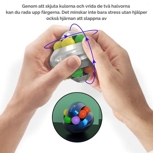 Händer som vrider en Magic Ball - sensorisk stimulans och logikträning i ett