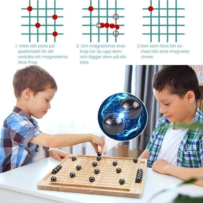 Barn som spelar Magnetic Chess, ett strategiskt magnetspel som tränar fokus, logiskt tänkande och tålamod