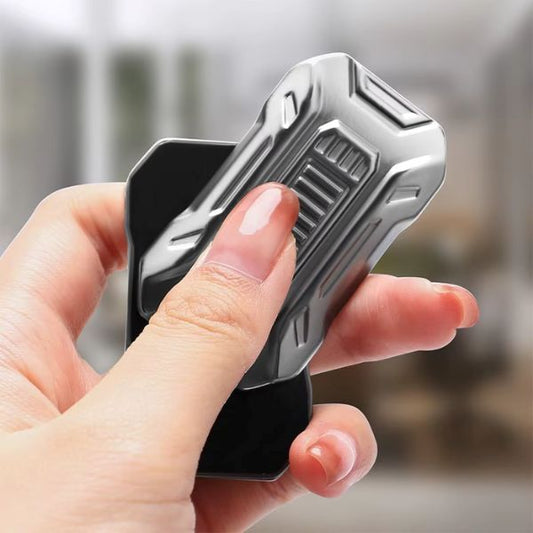 Magnetisk Infinity Slider hålls i handen – klickfunktion aktiveras med tumme