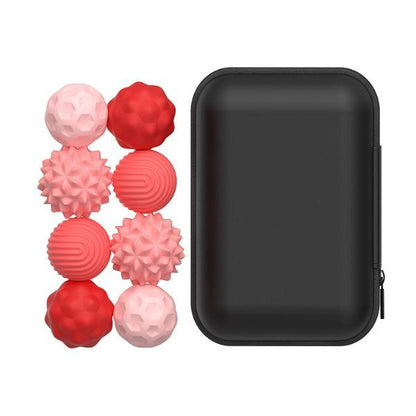 Magnetiska fidgetbollar i rosa och röd nyans med svart fodral, storlek medium.