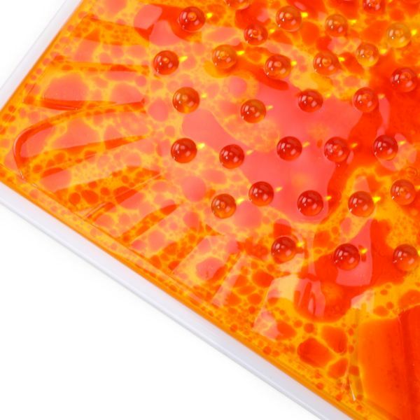 Närbild av den orange plattan med bubblor och detaljerad 3D-effekt