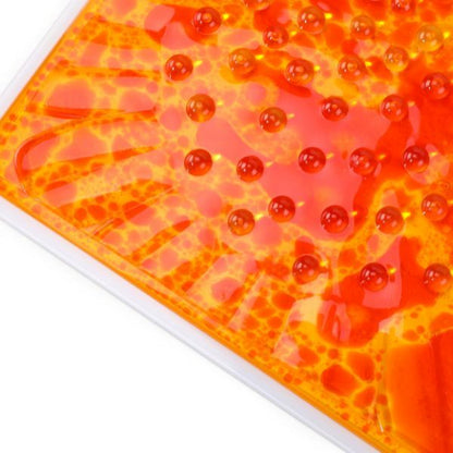 Närbild av den orange plattan med bubblor och detaljerad 3D-effekt