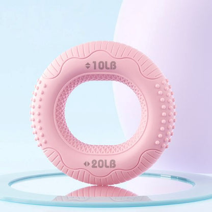 Rosa greppträningsring i silikon med motstånd på 10 och 20 LB