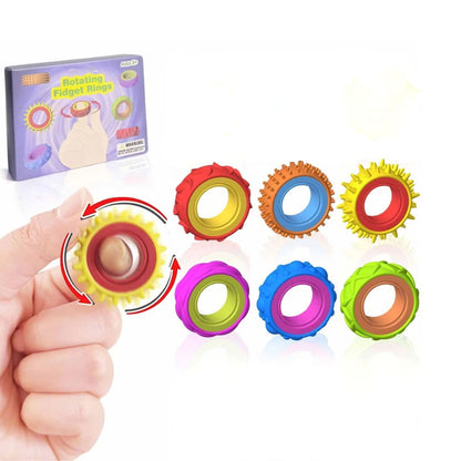 Roterande fidgetringar i 6 pack med olika färger och strukturer för taktil stimulans
