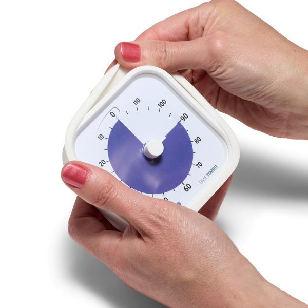 Time Timer MOD 120 min hålls i händer med skyddande vit silikonram för stabilitet och grepp