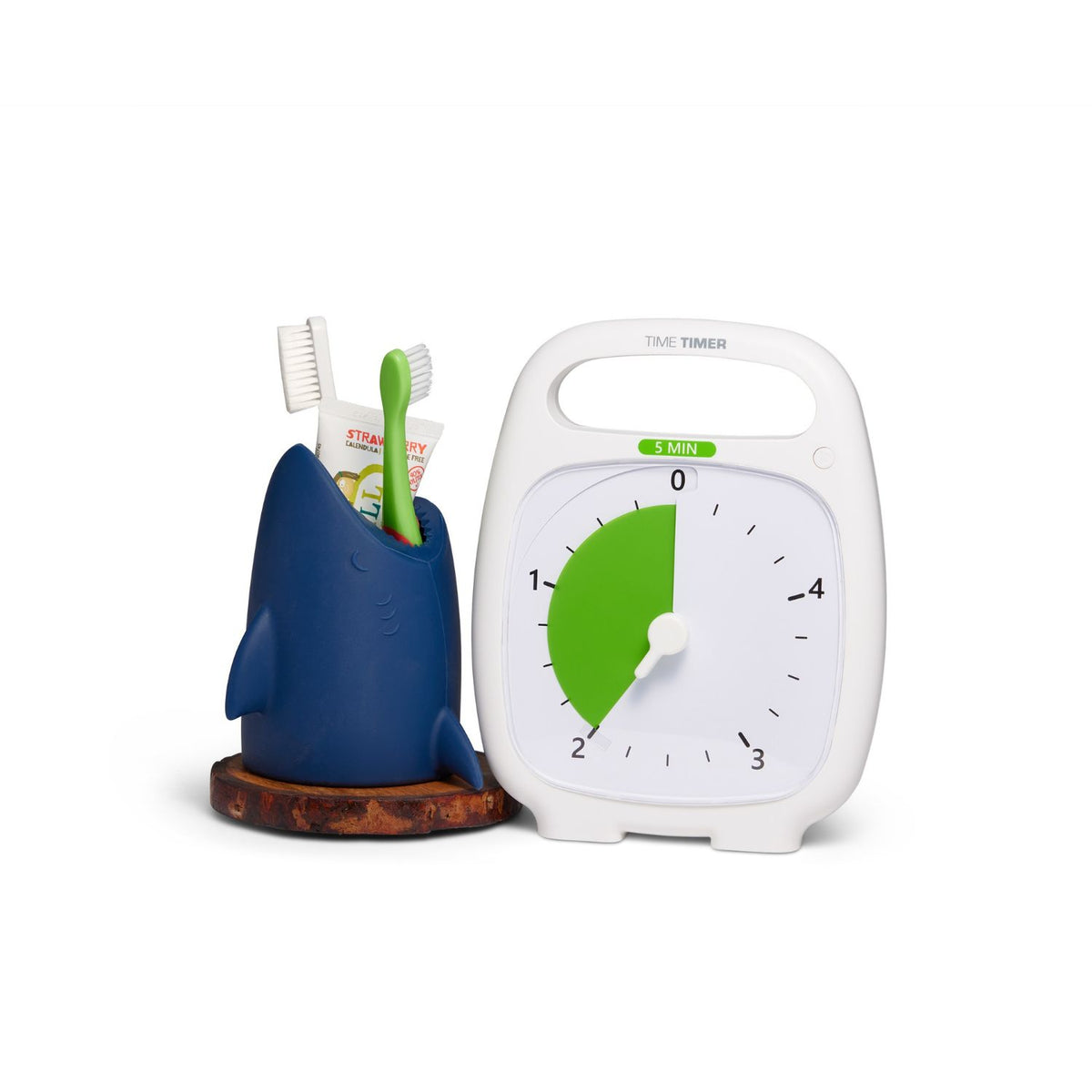 Time Timer PLUS 5 min bredvid tandborstar för att visualisera tiden vid tandborstning