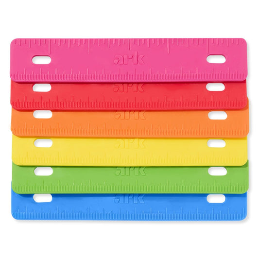 Färggranna tugghjälpmedel Binder Buddy i rosa, röd, orange, gul, grön och blå